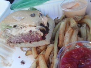 This vegan burger with the Garlic Sauce (The Gilroy) was SOO awesome we only see the remaining half in this picture.  Advice: dip fries in Garlic Sauce!  Yum.  ~_~ at Source Mini in Berkeley