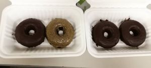 Double chocolate and salted caramel at Cartems Donuts - Downtown in Vancouver