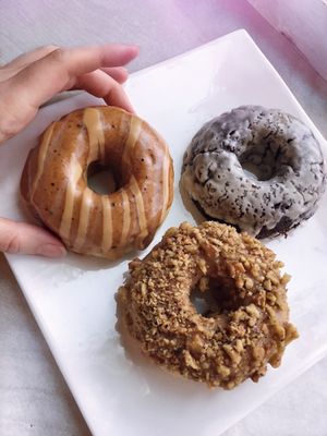 Pumpkin Spiced Donut, Smoked Maple Walnut and Salted Caramel Chocolate at Cartems Donuts - Downtown in Vancouver