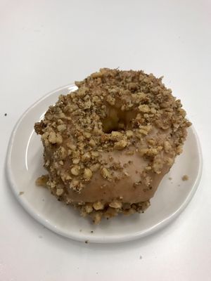 Smoked maple walnut 🍁  at Cartems Donuts - Downtown in Vancouver