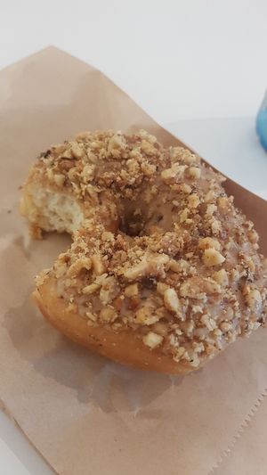 Sweet and salty smoked maple walnut at Cartems Donuts - Downtown in Vancouver
