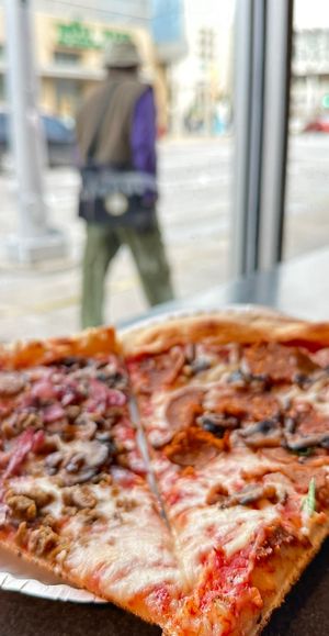 Right across from Whole Foods 😁  at Ian's Pizza in Milwaukee