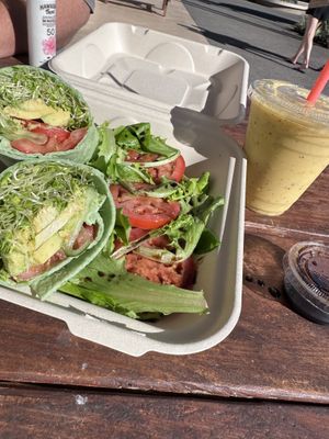 Vegan veg wrap with balsamic dressing side salad + fresh ginger turmeric juice    at Juice 101  in Kamuela