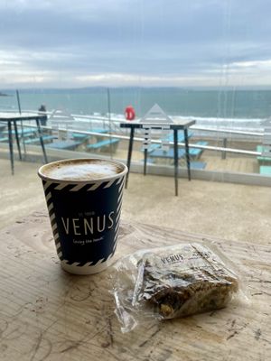 Latte, flapjack and sea views  at The Venus Cafe - Broadsands in Paignton