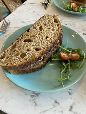 Vegan sausage sandwich on sourdough  at Ella's Cafe Lounge in Paignton