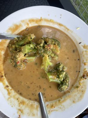 Broccoli in peanut sauce—we ate most of this before the picture! 😂  at Pingala Cafe in Burlington