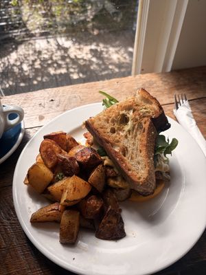 Vegan breakfast sandwich w/brekkie potatoes  at Huriyali Riverland in Charleston