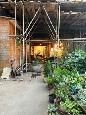 Entrance closest to lane way from main street with veggie garden at Miao Chu Tian Xiang Vegetarian - 妙厨天香素食 in Kunming