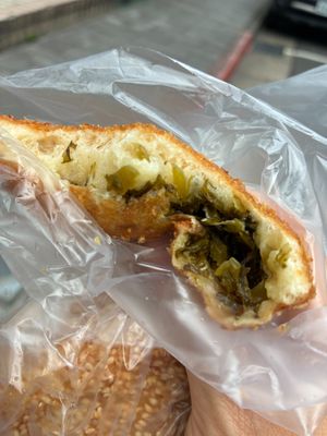 Inside of a pickled mustard green bun (酸菜包) at Twins Donuts - 雙胞胎甜甜圈 in Taipei