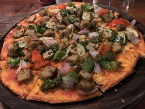 Vegan pizza  at The Dreaming Tree in Tiruvannamalai