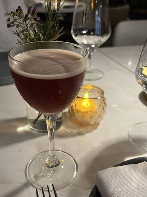 The Crimson. I ordered it because it sounded crazy, but it was so well-balanced it kind of knocked my socks off. Beet-infused gin, who knew!  at Reverie Restaurant and Cocktail Bar in Brooklyn