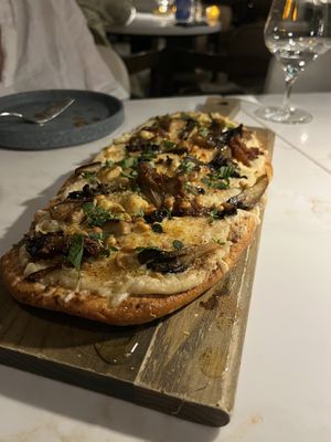 Shiitake Maitake Flatbread. This was a last-minute addition to the meal, and I’m so glad we got it! It ended up being my favorite dish.  at Reverie Restaurant and Cocktail Bar in Brooklyn