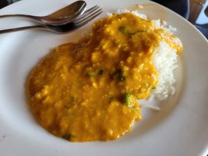 Yellow daal with rice at The Sitting Elephant in Rishikesh