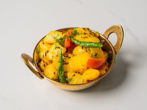 Aardappel met komijn  at Chopras Indian Restaurant in The Hague