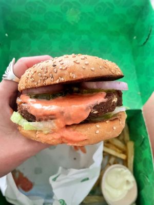 Asadito burger - 33bs including fries on PedidosYa app  at Rosa Verde in Cochabamba