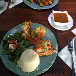 bread fruit fritters! w beans and rice at Ocean Park Cafe in San Juan