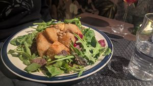 Potato dumplings with berries, apples and grilled vegetables at ÖUR in Stockholm