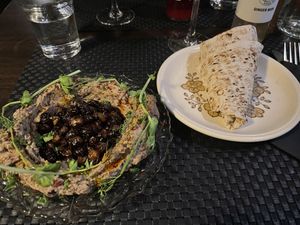 TJÅKKA smokey bean dip with grey peas and flatbread  at ÖUR in Stockholm