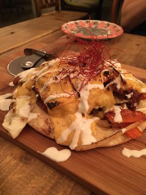 Soy meat yaki niku pizza with thin crust and soy cheese  at Paprika Shokudo Vegan in Osaka