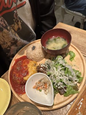 Hamburger with cheese and sides  at Paprika Shokudo Vegan in Osaka