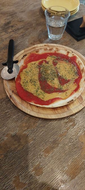 The tomato pizza with soy cheese at Paprika Shokudo Vegan in Osaka