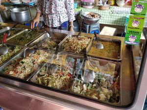 3 generations of HappyCow stickers spotted at Pho Jan vegetarian in Phetchabun