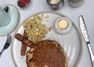 Pancake platter with plain pancakes, tempeh bacon and tofu scramble at Fresh on Eglinton in Toronto