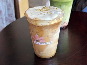 Osmanthus cold foam latte  at Dialogue Coffee & Flowers in New York City