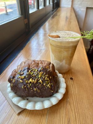 Chocolate pistachio croissant and carrot cake lattee  at Dialogue Coffee & Flowers in New York City