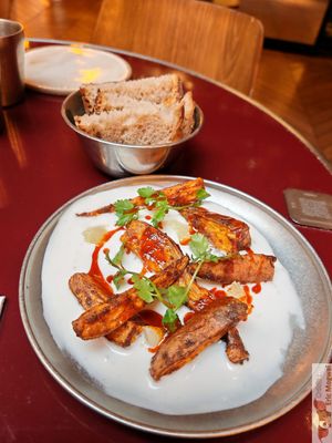 Sweet potato coconut masala
Roasted sweet potatoes with garam masala, coconut-lemongrass sauce, smoked paprika oil, and cilantro. at Maslow - Temple in Paris