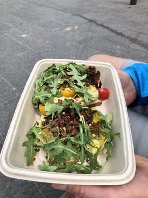 Avocado toast with mushrooms, arugula and tomato was delicious! at Cocobeet in Boston