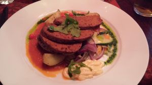 Seuran dish with potato wedges and marinated veggies  at Sohwi in Jyvaskyla