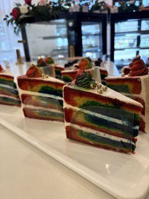 Rainbow Cake Slices  at Sweet Gilly's Specialty Bakeshop in Frisco