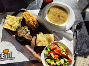 Vegan platter (soup, salad, pie, stuffed aubergine and stuffed bell pepper) at Genti Breakfast & Restaurant in Shkoder