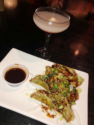 Their veggie gyoza with a Lychee-Toni✨✨ ! insta @ gabeedeeats at Sticky Rice in Washington