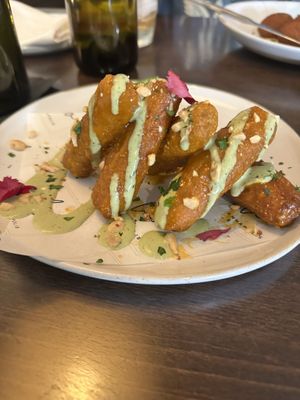 Vegan Chicken Sticks (tofu) with flavorful tangy sauce.   at Leo in Annapolis