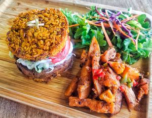 Spiced fish burger, comes with sweet potato fries and salad at Afterglow by ANGLOW in Central Singapore