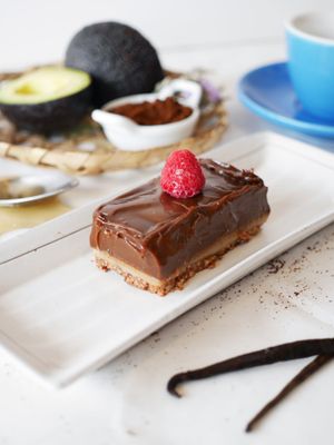 Raw Chocolate Salted Caramel Fudge. Made from pure cacao butter and fresh avocado. Salted Caramel is made from tahini butter at Afterglow by ANGLOW in Central Singapore