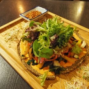 Raw pizza $21 at Afterglow by ANGLOW in Central Singapore
