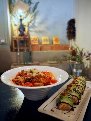 Spicy Asian noodles and Kimchi avocado rolls at Afterglow by ANGLOW in Central Singapore