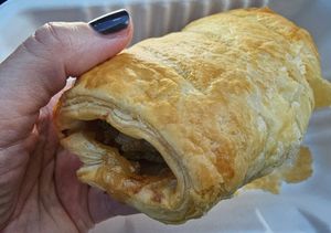 Vegan 'pork' and apple sauce sausage roll at Coffee Chameleon  in Sandown