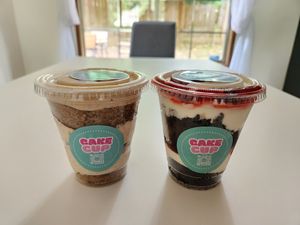 Cookie "butter" and chocolate cherry vanilla frosting cake cups at Hollywood Baked Goods in Kirkland