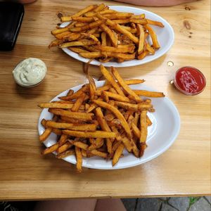 2x homemade fries with 1 serving of mayo and 1 serving of ketchup at Vegi in Tubingen