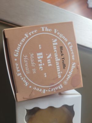 Black truffle Mac Nut brie by the Vegan Cheese Shoppe (local) at KailuaTown Farmers Market  in Kailua