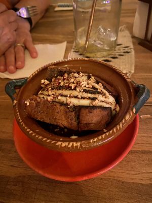 This was dessert; banana bread with a coconut sauce finished with a light decorative touch of fire!  at Cósmica Cocina  in Puerto Vallarta