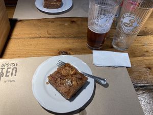 Toetje,… lekker zoet kaneel, amandelspijs gebak 😋  at Upcycle Milano Bike Cafe in Milan