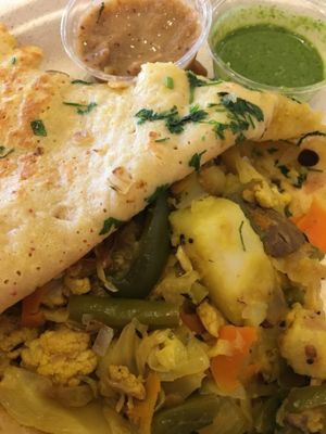 Yellow lentil dosa with cauliflower filling at DC Dosa - Kiosk in Washington
