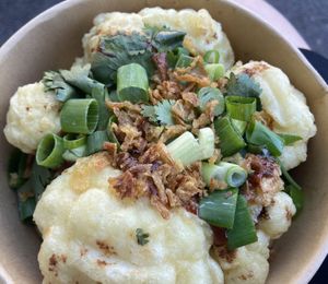 Cauliflower wings with barbecue sauce in the middle  at The Green Garden in Salzburg
