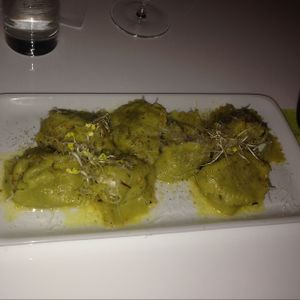 Handmade truffle pasta served with orange butter and Parmesan (vegetarian) at The Green Garden in Salzburg