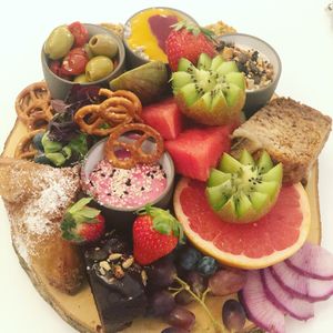 Vegan brunch platter with french toast, banana bread, avocado, hummus, brownies at The Green Garden in Salzburg